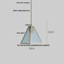 Modern geometric blue glass and brass pendant light – dining room
