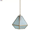 Modern geometric blue glass and brass pendant light – dining room