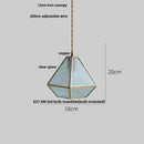 Modern geometric blue glass and brass pendant light – dining room