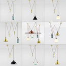 Modern geometric brass & black glass pendant light dining room