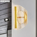 Modern geometric gold sconce light – living room grid pattern