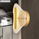 Modern geometric gold sconce light – living room grid pattern