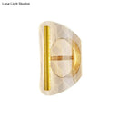 Modern geometric gold sconce light – living room grid pattern