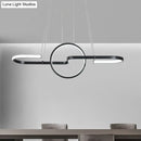 Modern geometric led dining room light in black & gold warm white light
