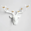 Modern geometric white and gold deer head wall decor living room