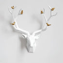 Modern geometric white and gold deer head wall decor living room