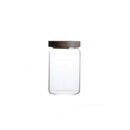 Modern glass hermetic storage jars with dark wood airtight lids kitchen