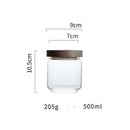 Modern glass hermetic storage jars with dark wood airtight lids kitchen
