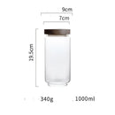 Modern glass hermetic storage jars with dark wood airtight lids kitchen