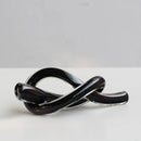 Modern glossy black geometric glass sculpture living room knot decor