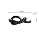 Modern glossy black geometric glass sculpture living room knot decor