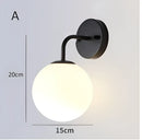 Modern gold and black led glass ball wall lights for bedroom