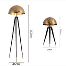 Modern gold and black tripod floor lamp living room decorbites coyote