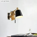 Modern gold and black wall sconce bedroom light with barrel shade