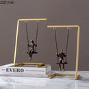 Modern gold and bronze swing metal sculpture living room decor