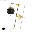 Modern gold and clear black glass ball sconce – bedroom wall light