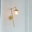 Modern gold and clear black glass ball sconce – bedroom wall light