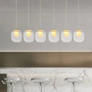Modern gold and glass pendant lights for dining room