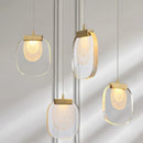 Modern gold and glass pendant lights for dining room