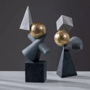 Modern gold ball triangular statues gray & white living room decor