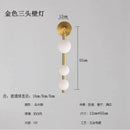 Modern gold & black glass ball wall lights living room decorbites