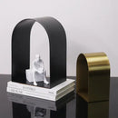 Modern gold & black golden arches metal sculpture living room bookend