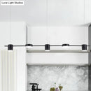 Modern gold & black linear chandelier dining room warm white light