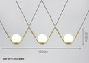 Modern gold & black pendant light dining room spherical glass trio