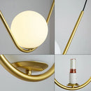 Modern gold & black pendant light dining room spherical glass trio