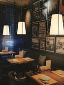 Modern gold & black pendant lights with fabric shades dining room