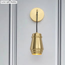 Modern gold brass bedroom wall sconce with metal shade fixture