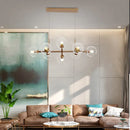 Modern gold chandelier with clear glass globes for dining room