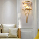Modern gold curved wall light with clear crystal prism bedroom