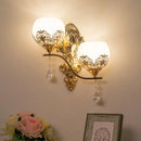 Modern gold finish dome wall sconce with crystals for living room