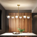 DecorBites™ Nordic Metal 6-Head Linear Island Light with Gold Finish and Clear Glass Globes