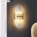 Modern gold flute shaped wall sconce with clear crystal rods bedroom