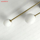 Modern gold glass ball wall lamp bedroom dual frosted sconce