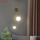 Modern gold glass ball wall lamp bedroom dual frosted sconce