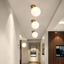 Modern gold glass ball wall lamp for bedroom with frosted globe