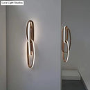 Modern gold interlocking oval led wall lamp living room