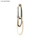 Modern gold interlocking oval led wall lamp living room