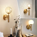 Modern gold iron led sconce lamp with textured glass for bedroom