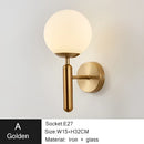 Modern gold iron led sconce lamp with textured glass for bedroom