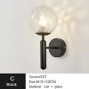 Modern gold iron led sconce lamp with textured glass for bedroom