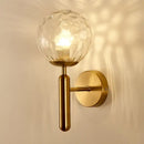 Modern gold iron led sconce lamp with textured glass for bedroom