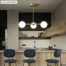 DecorBites™ Sleek and Elegant Linear Gold Island Pendant Lighting with Spherical Glass Shades for Dining Table