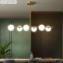 DecorBites™ Sleek and Elegant Linear Gold Island Pendant Lighting with Spherical Glass Shades for Dining Table