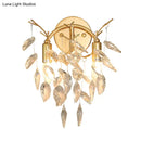 Modern gold leaf wall lamp with beveled crystal for living room