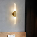 Modern gold led sconce with clear white glass – bedroom wall light