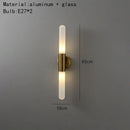 Modern gold led sconce with clear white glass – bedroom wall light
